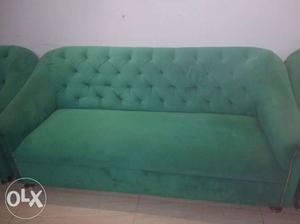 Green Fabric Tufted Sofa With Throw Pillows