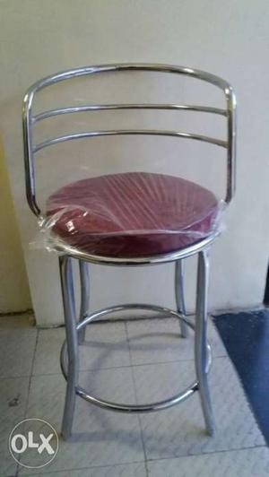Stainless Steel Framed White Leather Padded Chair