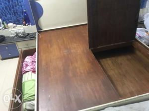 Teakwood bed with storage on both sides