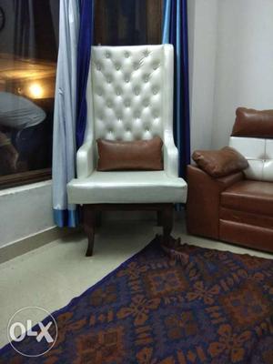 Tufted White Armchair With Brown Wooden Base