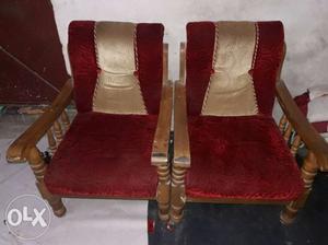 Two Brown Wooden Base Red Suede Padded Armchairs