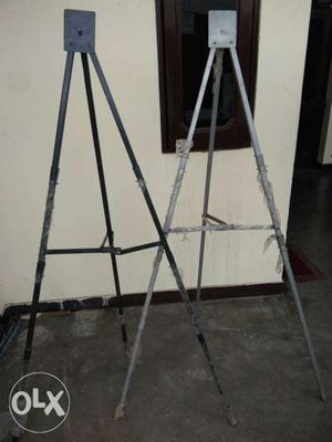 Two Gray Metal Stands