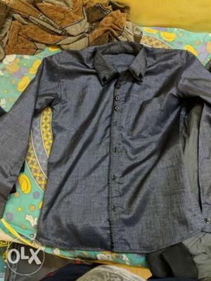 A grey color shiny party or wedding purpose shirt