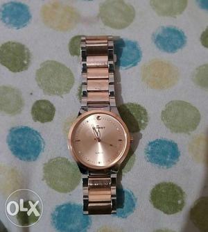 A rose gold colour quality woman's watch of