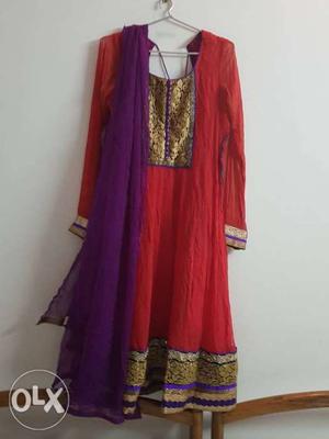 Beautiful red and purple anarkali suit.