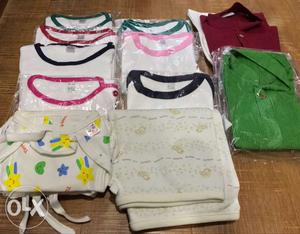 For 6-12 months old baby: 7 t-shirts, 4 nappies,