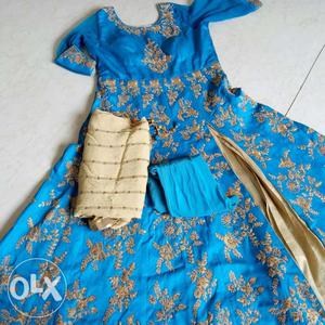 Fully golden embroidered gown back front with
