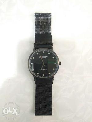 Its An Forest brand watch which is black in