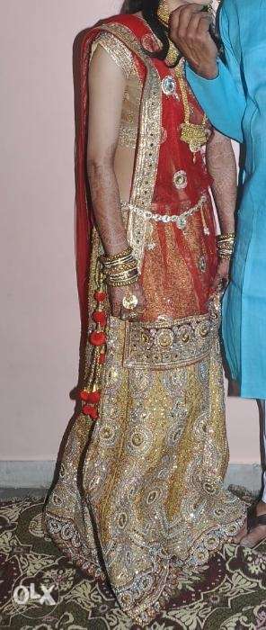 Lehenga (golden & red colour) Only one time Use