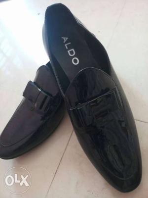 Pair Of Black Aldo Patent Leather Loafers