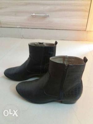 Pair Of Black Leather Side-zip Boots