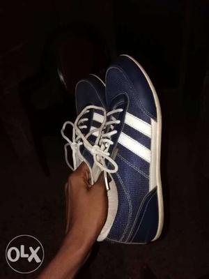 Pair Of Blue-and-white Sneakers