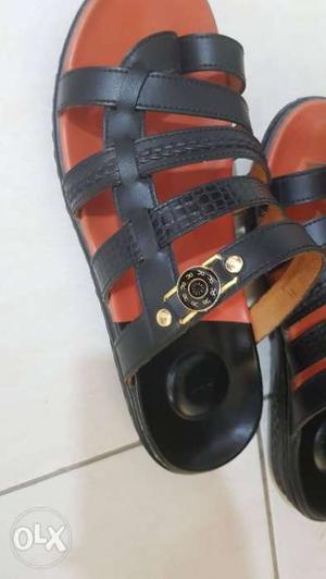 Pair Of Brown-and-black Slide Sandals