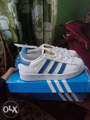 Pair Of White Adidas Low-top Sneakers