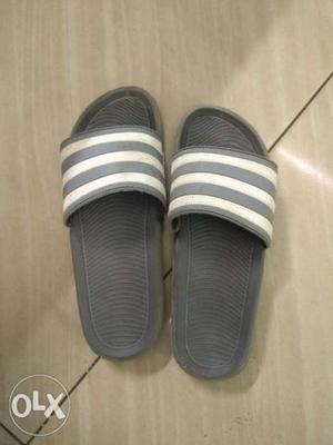 Pair Of White-and-black Adidas Slide Sandals