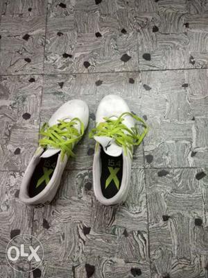 Pair Of White-and-green Leather Low-top Sneakers