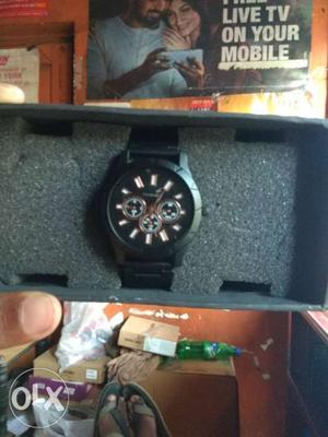 Round Back Chronograph Watch With Black Strap And Box