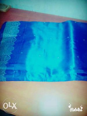 Tjis coloure is blue his silk sari