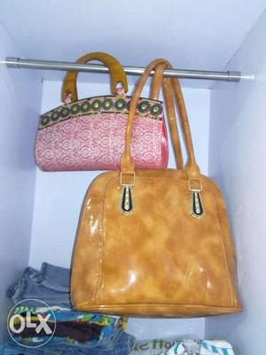 Two Brown And Pink Leather Handbags