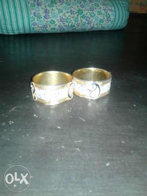 Two Gold-colored Band Rings