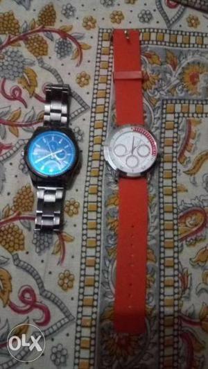 Two Round Blue And White Chronograph Watches