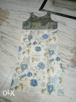 White, Blue, And Yellow Floral Sleeveless Dress
