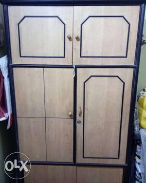 3 shelved Ply wooden cupboard.