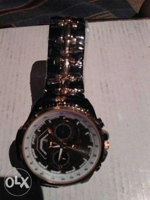 Black and copper color new brand unuse rist watch