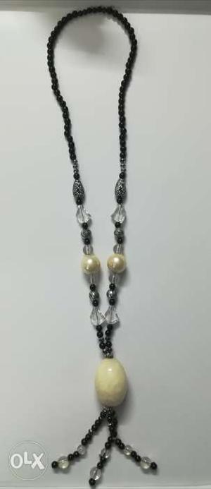 Black bead necklace with pearls. Pair it up with