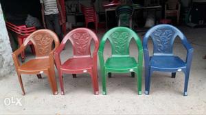 Brown, Red, Green, And Blue Monobloc Armchairs