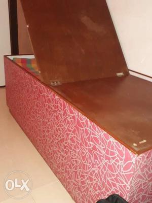 Brown Wooden bed in very good condition with storage