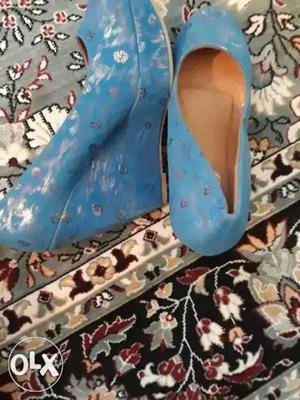 Pair Of Blue Suede Wedge Sandals