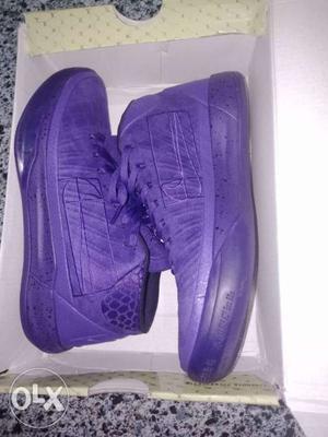 Pair Of Purple Nike Low-top Sneakers