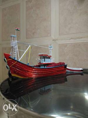 Red And White Miniature Sailship