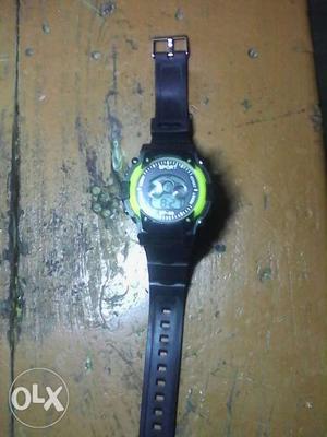 Round Green Digital Watch With Black Rubber Strap