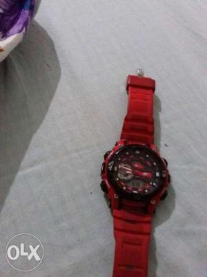 Round Red Chronograph Watch With Red Strap
