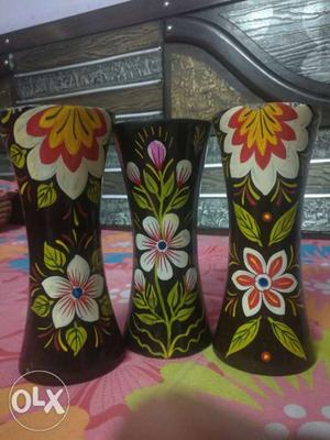 Several Black Floral Ceramic Vases