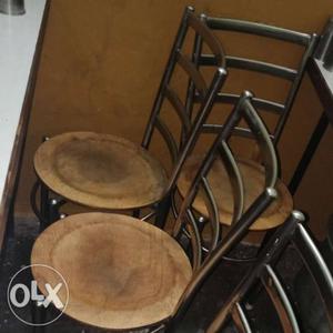 Two Brown Wooden Bar Stools