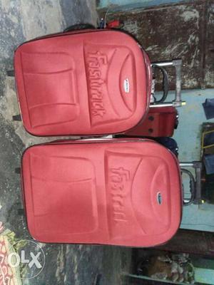 Two Red Luggages