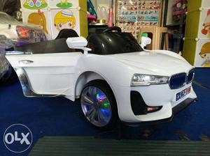 White BMW Ride On Car Toy at KIDS CORNER.