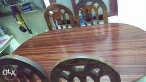 Wooden dining set 4 chair. less used. and goog