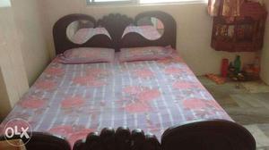 5*6 wooden double bed with storage is immediately available