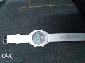 Adidas white watch. selling at low price, for
