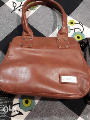 Brown leather branded purse