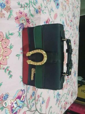 GUCCI -Black, Green, And Red Leather Handbag