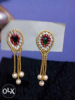 Pair Of Gold-colored Drop Earrings With Gemstones