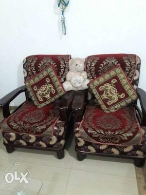 Two Brown-and-red Floral Sofa Chairs