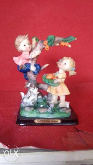 Two Toddler On Tree Figurine