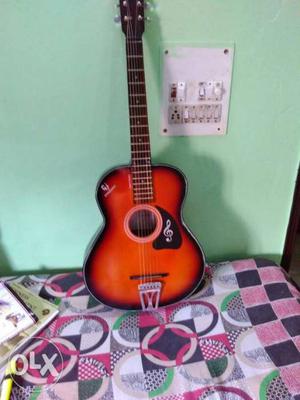 6 string guitar in good condition with warranty