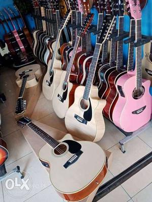 Beige And Pink Acoustic Guitar Lot